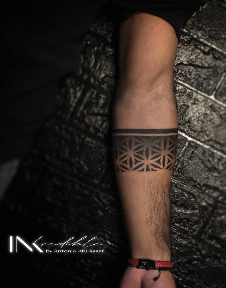 Armband with Geometrical Dear | Deer tattoo designs, Wrist tattoos for  guys, Hand tattoos for guys