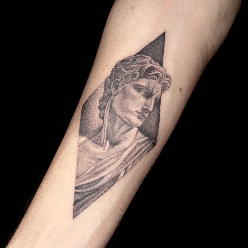 Adding to a sleeve dedicated to Greek mythology, this radiant tattoo of  Apollo, the Sun God, shines bright on the forearm. Representing c... |  Instagram